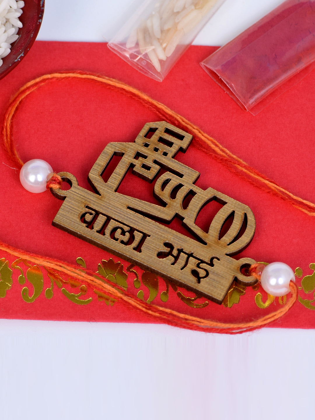 The Magic Wand Camera Carved Wooden Rakhi - Red