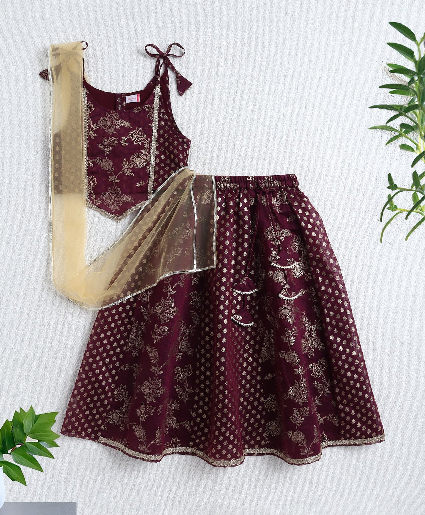 The Magic Wand Woven Shoulder Tie Up Foil Printed Trendy Long Yoke Choli with Lehenga Set with Dupatta- Wine