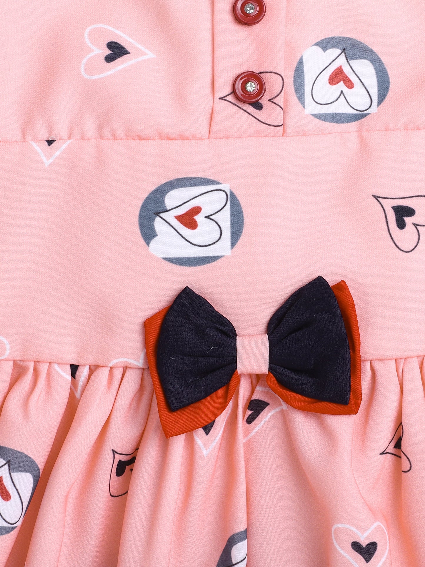 Heart Printed Flutter Sleeve Dress With Bow For Girls-Peach