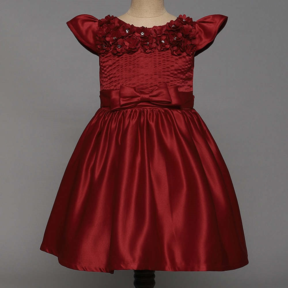 The Magic Wand Solid Satin Cap Sleeves Flower Embelished Party Dress For Girls With Bow Maroon