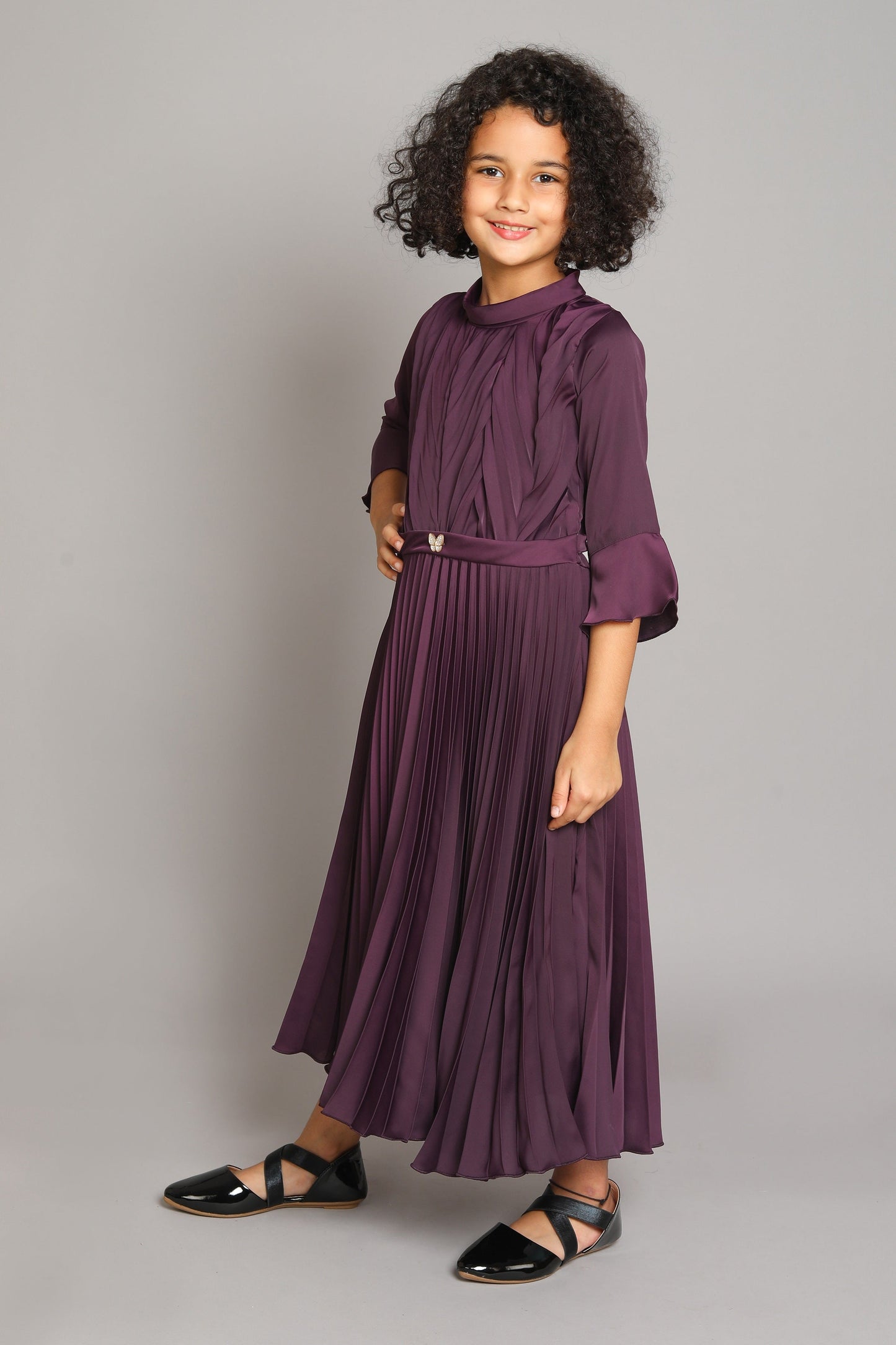 The Magic Wand Solid 3/4th Sleeves Pleated Fit & Falre Party Gown With Butterfly Applique For Girls Magenta