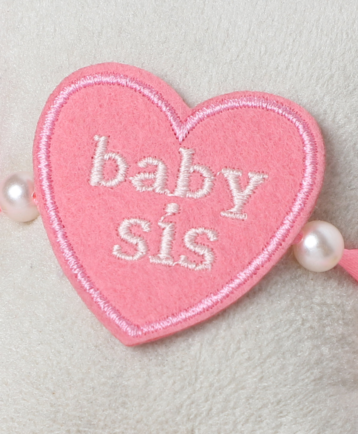 The Magic Wand Baby Sis Heart Shaped Rakhi - Pink