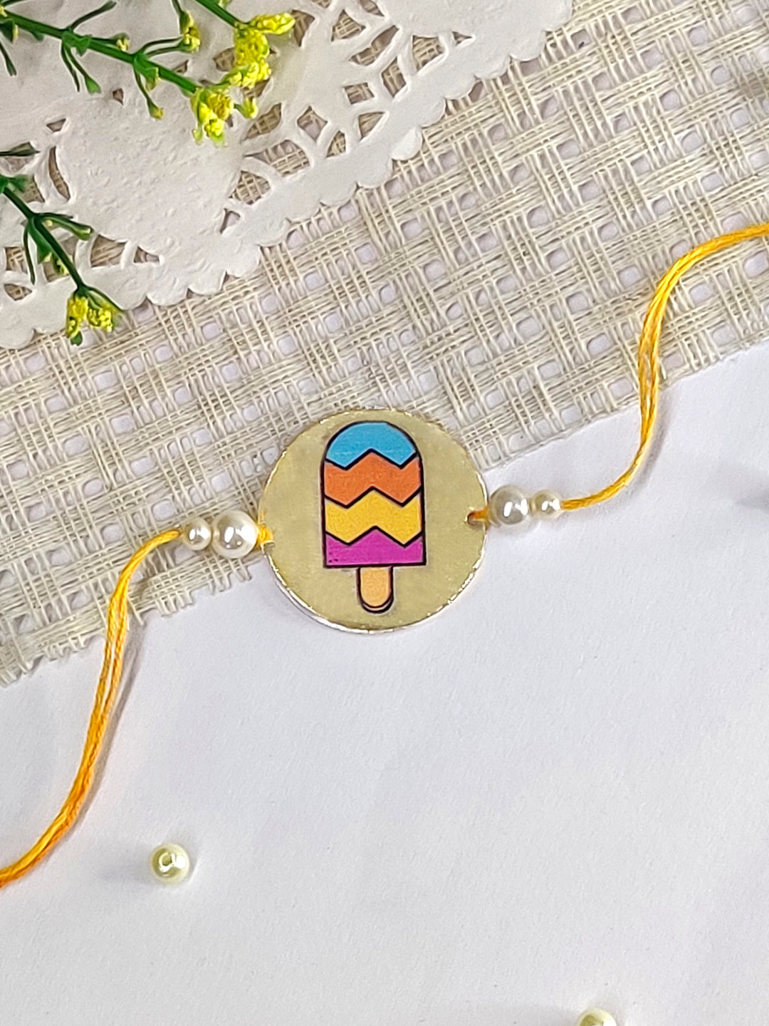 The Magic Wand Ice Candy Printed Rakhi With Pearls - Multi Colour