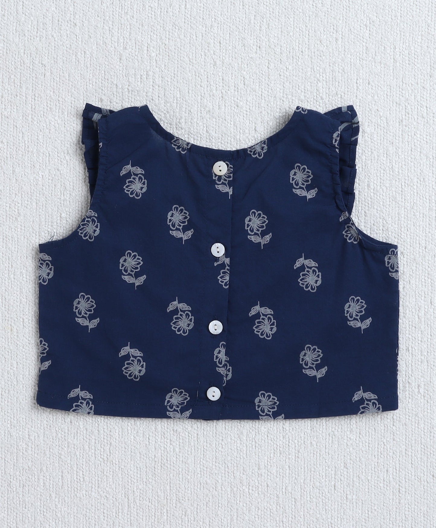 The Magic Wand Cambric Cotton Sleeveless Floral Printed Lace Detailing Frill Choli and Lehenga Set- Blue