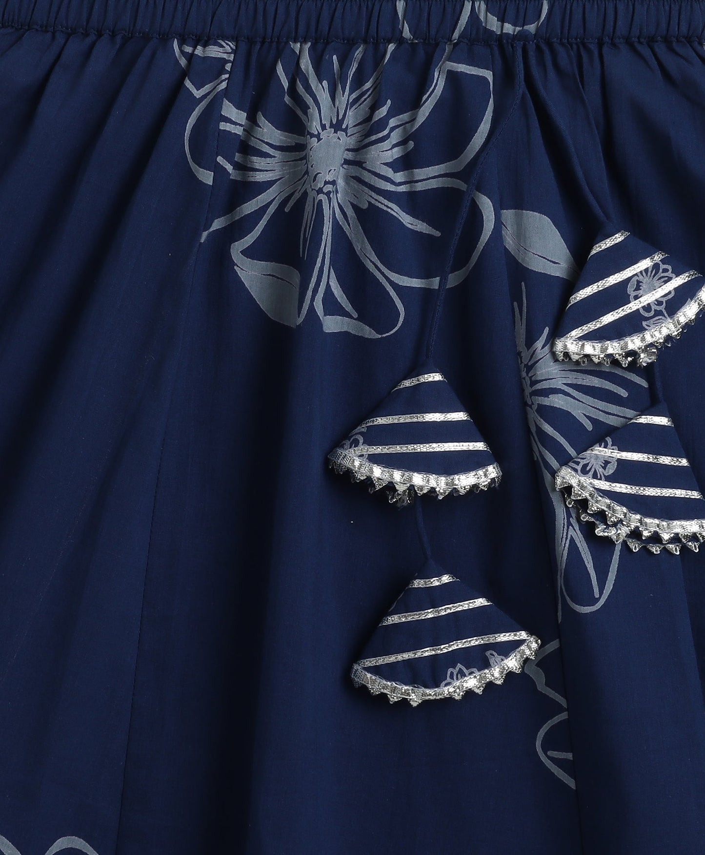 The Magic Wand Cambric Cotton Sleeveless Floral Printed Lace Detailing Frill Choli and Lehenga Set- Blue