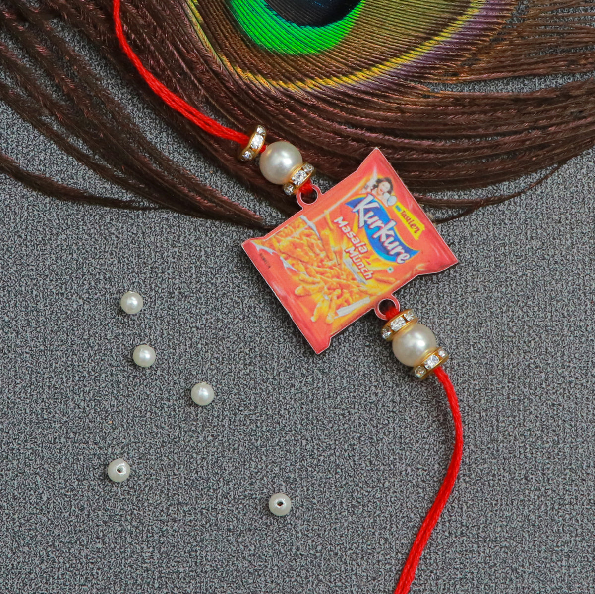 The Magic Wand Trendy Kurkure Printed Rakhi - Red
