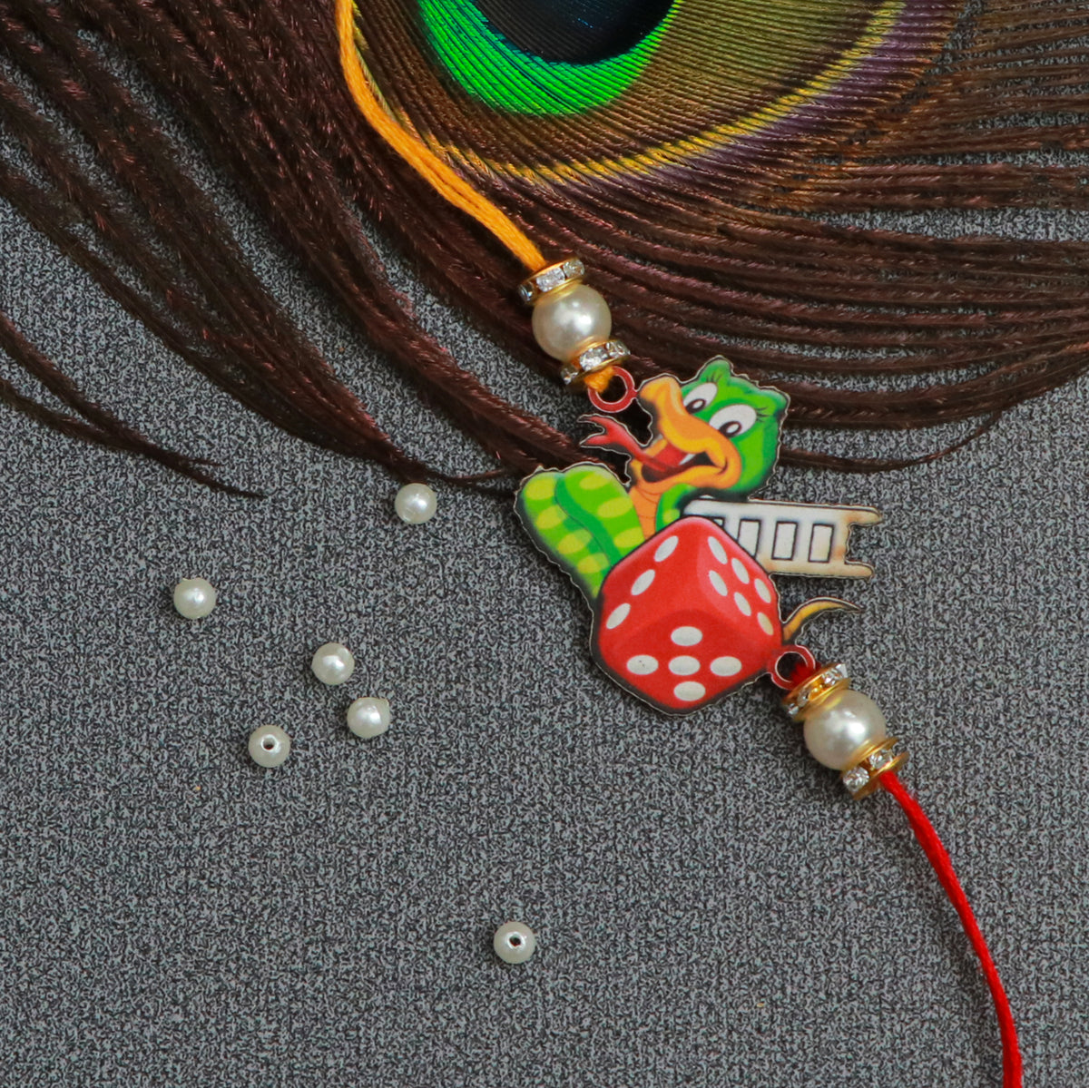 The Magic Wand Trendy Ludo Printed Rakhi - Red