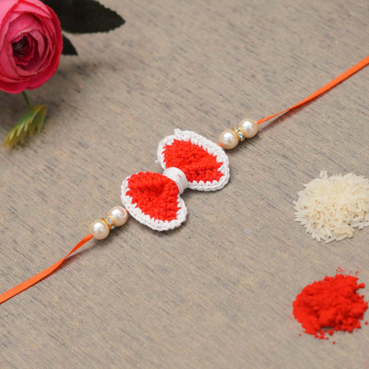 The Magic Wand Trendy Handcrafted Crochet Bow Shaped Rakhi - Red