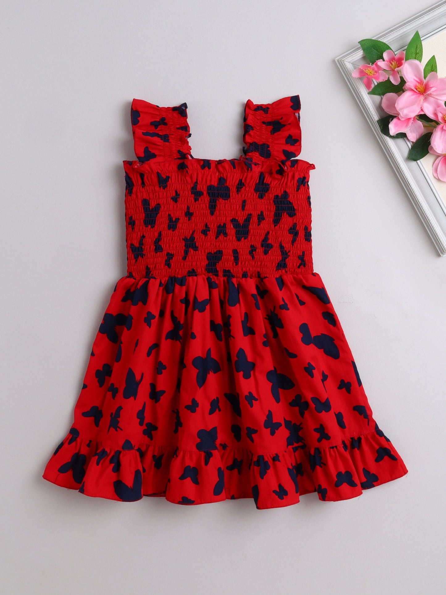 The Magic Wand Sleeveless Smoke Detail Butterfly Printed Frill Dress- Red
