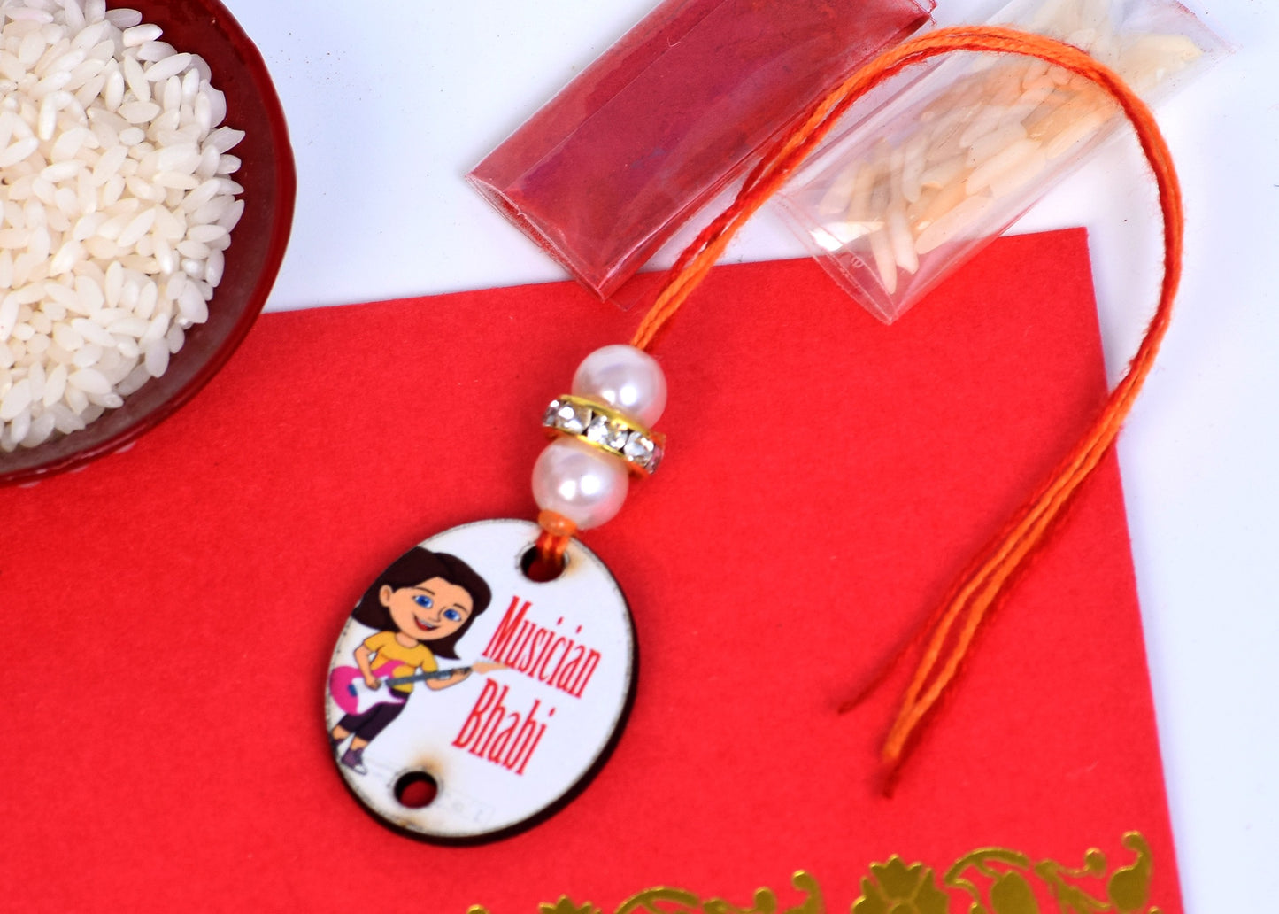 The Magic Wand Musician Bhabhi Wooden Rakhi - Red