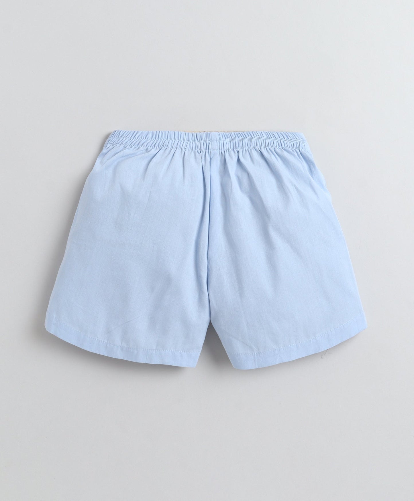 The Magic Wand Cotton Woven Solid Sleeveless Curvy Hem Top And Shorts Set - Blue