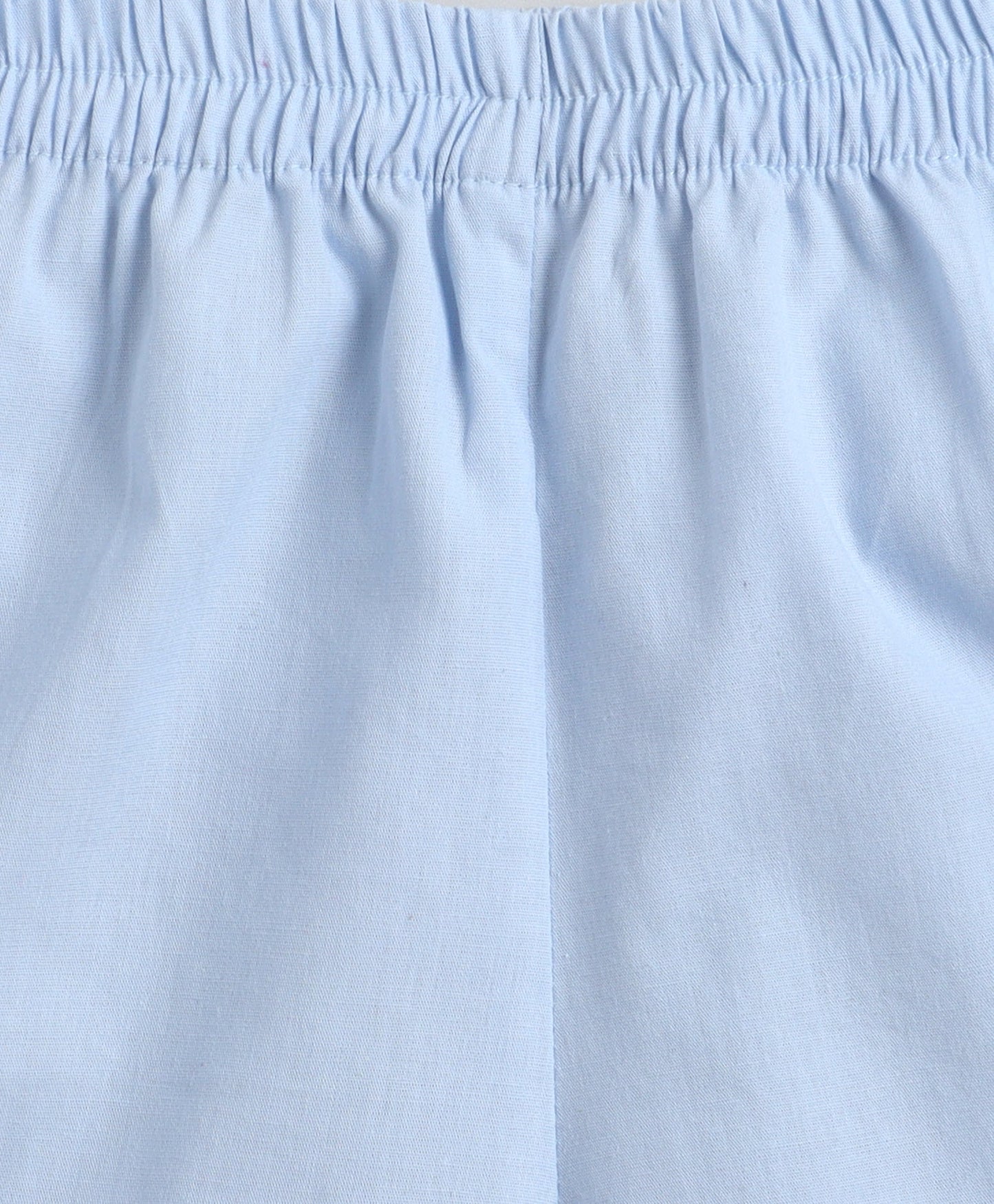 The Magic Wand Cotton Woven Solid Sleeveless Curvy Hem Top And Shorts Set - Blue