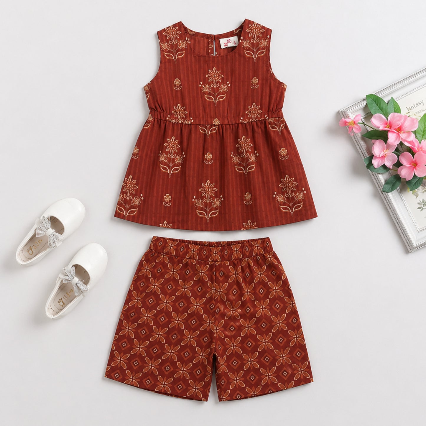 The Magic Wand Cotton Woven Sleeveless Floral Printed Peplum Top And Shorts Set - Rust