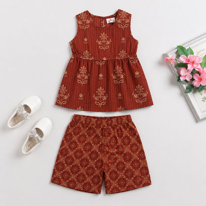 The Magic Wand Cotton Woven Sleeveless Floral Printed Peplum Top And Shorts Set - Rust