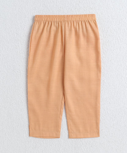 The Magic Wand Woven Shoulder Tie Up AII Over Butti Kurti with Bottom Set Peach