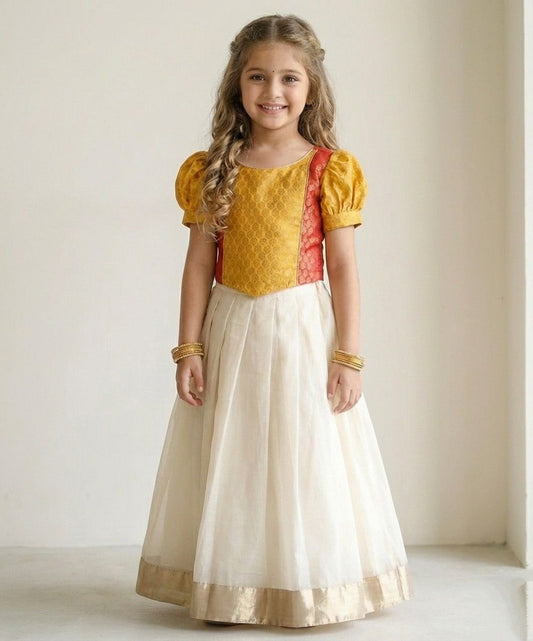 The Magic Wand Jacquard Puff Sleeves Lace Embellished Pattu Pavadai Lehenga Choli Set - Mustard