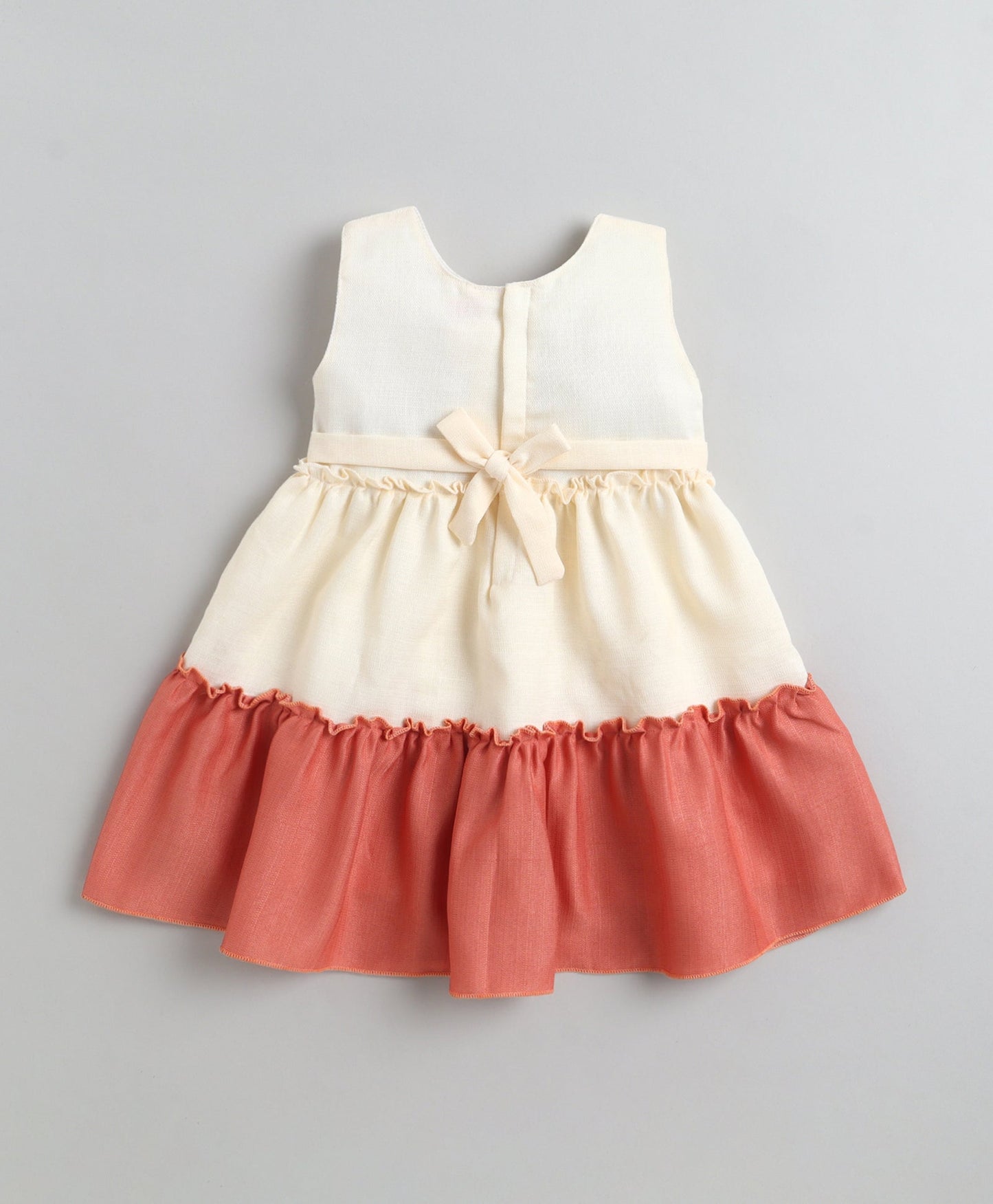 The Magic Wand Woven Sleeveless Tiered Dress With Bow Applique - Rust Orange