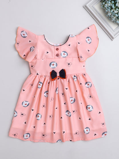 Heart Printed Flutter Sleeve Dress With Bow For Girls-Peach