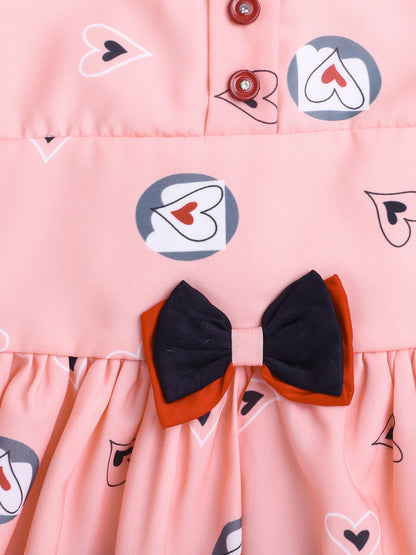 Heart Printed Flutter Sleeve Dress With Bow For Girls-Peach