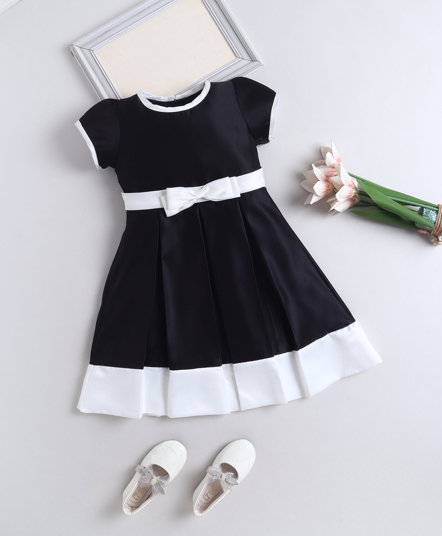 The Magic Wand Woven Puff Sleeves Colourblocked Pleated Party Dress With Bow - Black