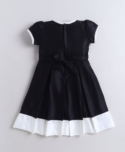 The Magic Wand Woven Puff Sleeves Colourblocked Pleated Party Dress With Bow - Black