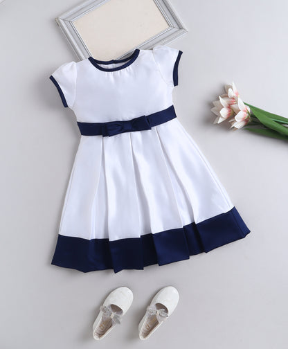 The Magic Wand Woven Puff Sleeves Colourblocked Pleated Party Dress With Bow - White