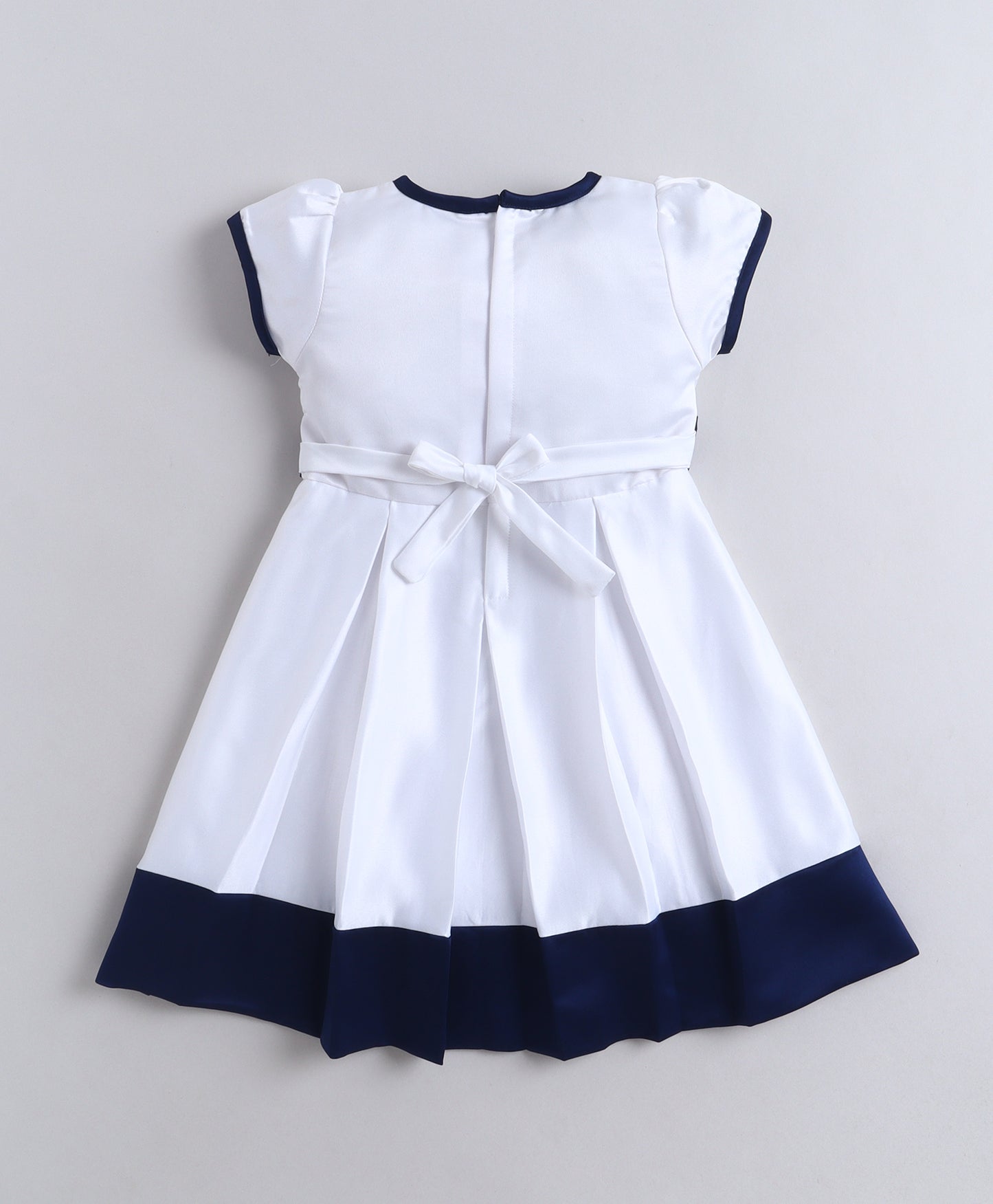 The Magic Wand Woven Puff Sleeves Colourblocked Pleated Party Dress With Bow - White