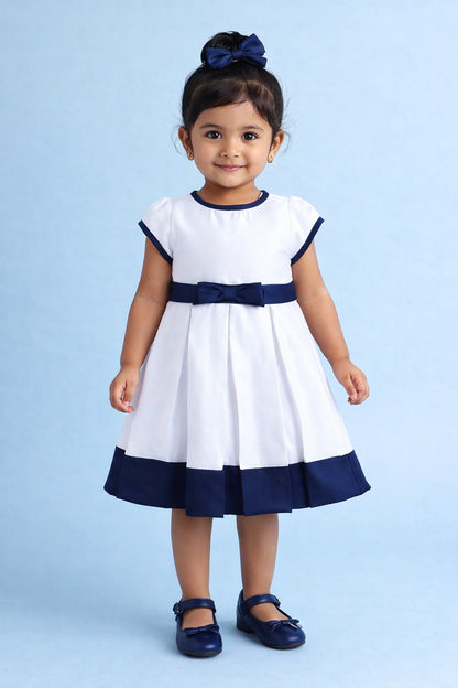 The Magic Wand Woven Puff Sleeves Colourblocked Pleated Party Dress With Bow - White