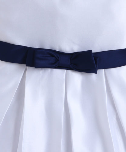The Magic Wand Woven Puff Sleeves Colourblocked Pleated Party Dress With Bow - White