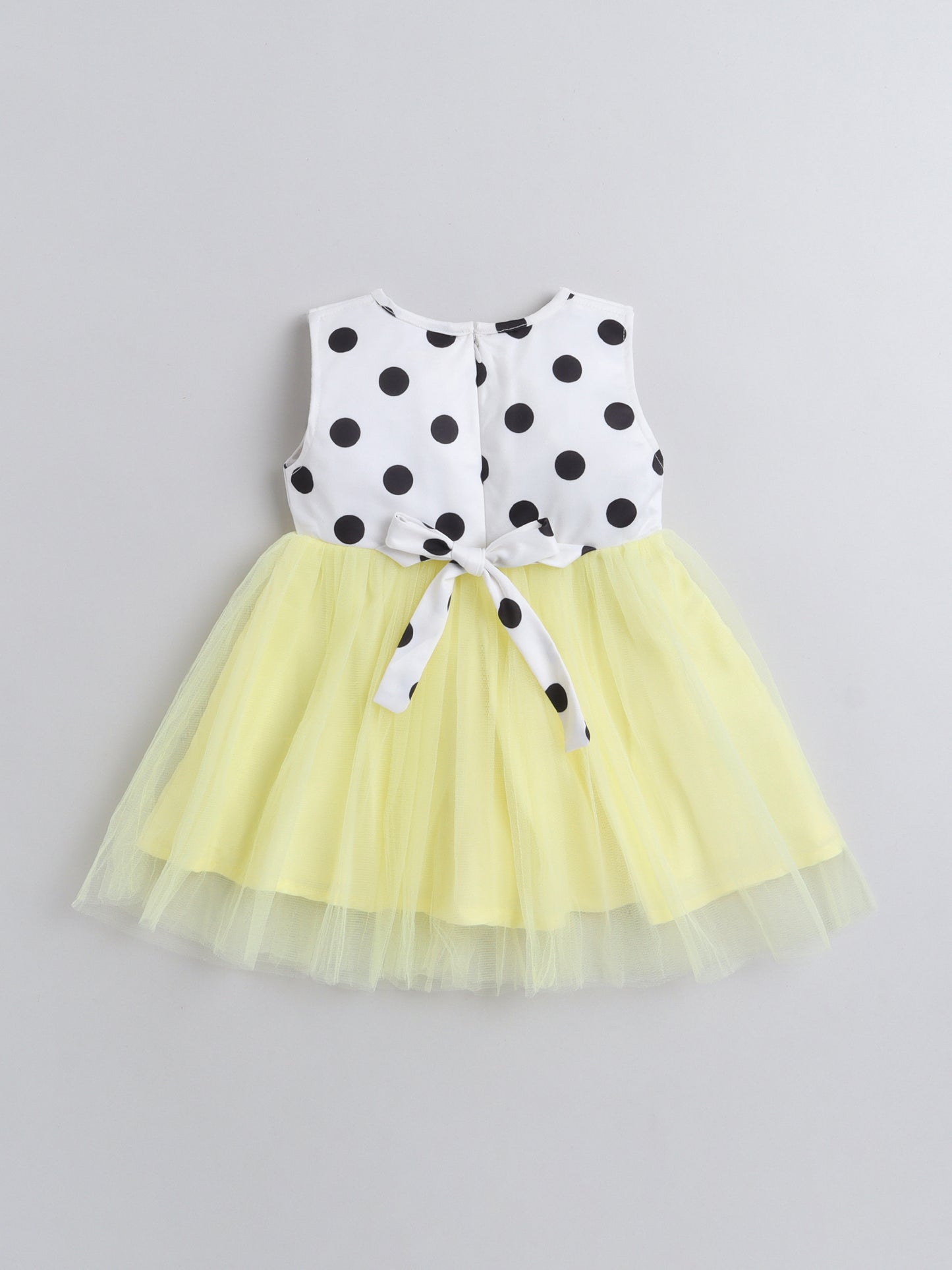 Sleeveless Polka Dots Printed Tiered Party Wear Dress With Floral Corsage   White Yellow