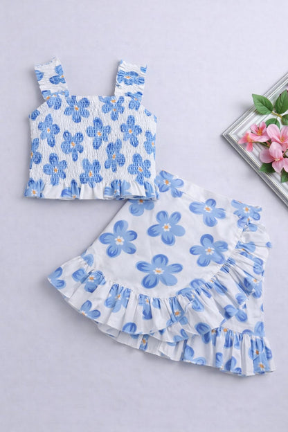 The Magic Wand Cotton Woven Sleeveless Floral Printed Smocked Top And Wrap Frill Skirt - Blue
