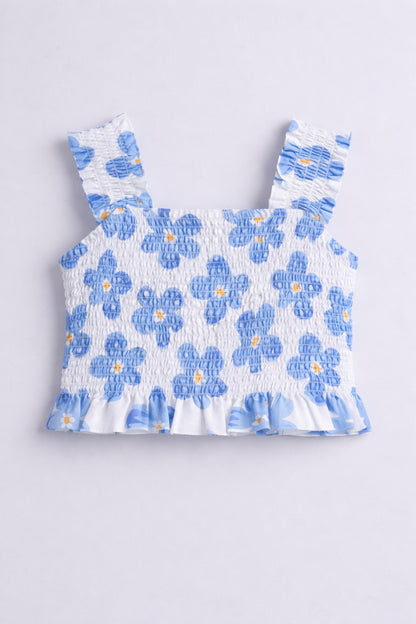 The Magic Wand Cotton Woven Sleeveless Floral Printed Smocked Top And Wrap Frill Skirt - Blue
