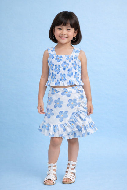 The Magic Wand Cotton Woven Sleeveless Floral Printed Smocked Top And Wrap Frill Skirt - Blue