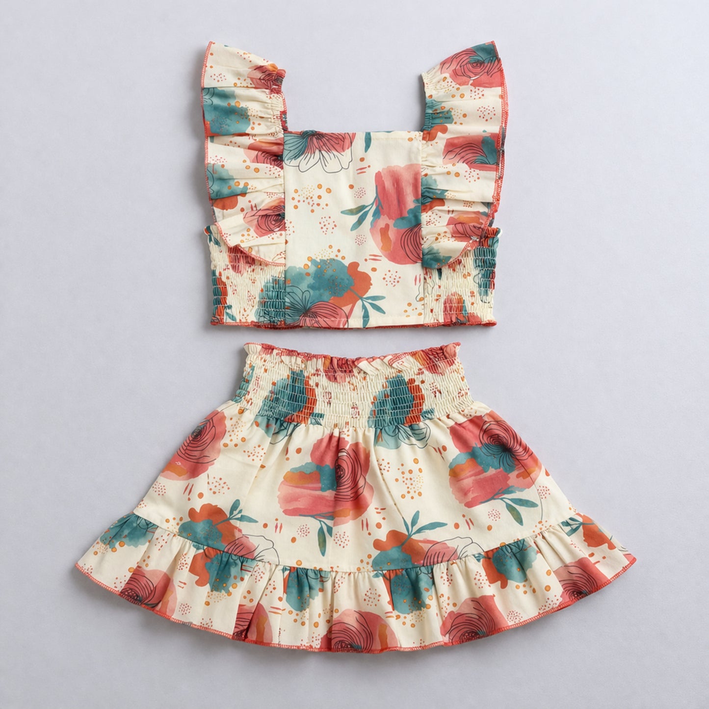 The Magic Wand Cotton Woven Ruffle Sleeves Floral Printed Smocking Top And Skirt Set - Coral