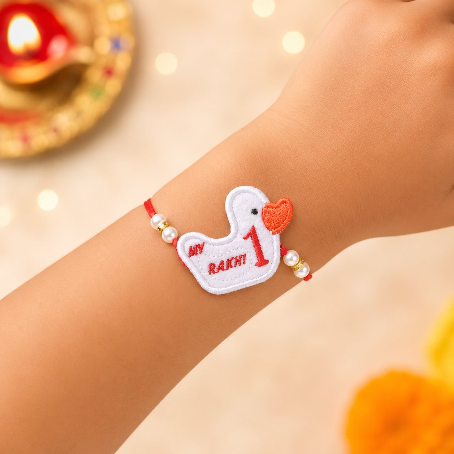 The Magic Wand Trendy Duck Applique My First Rakhi - White