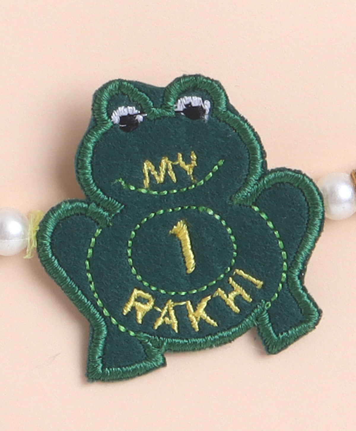 The Magic Wand Trendy Frog Applique My First Rakhi - Bottle Green