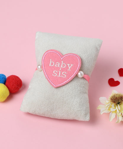 The Magic Wand Baby Sis Heart Shaped Rakhi - Pink