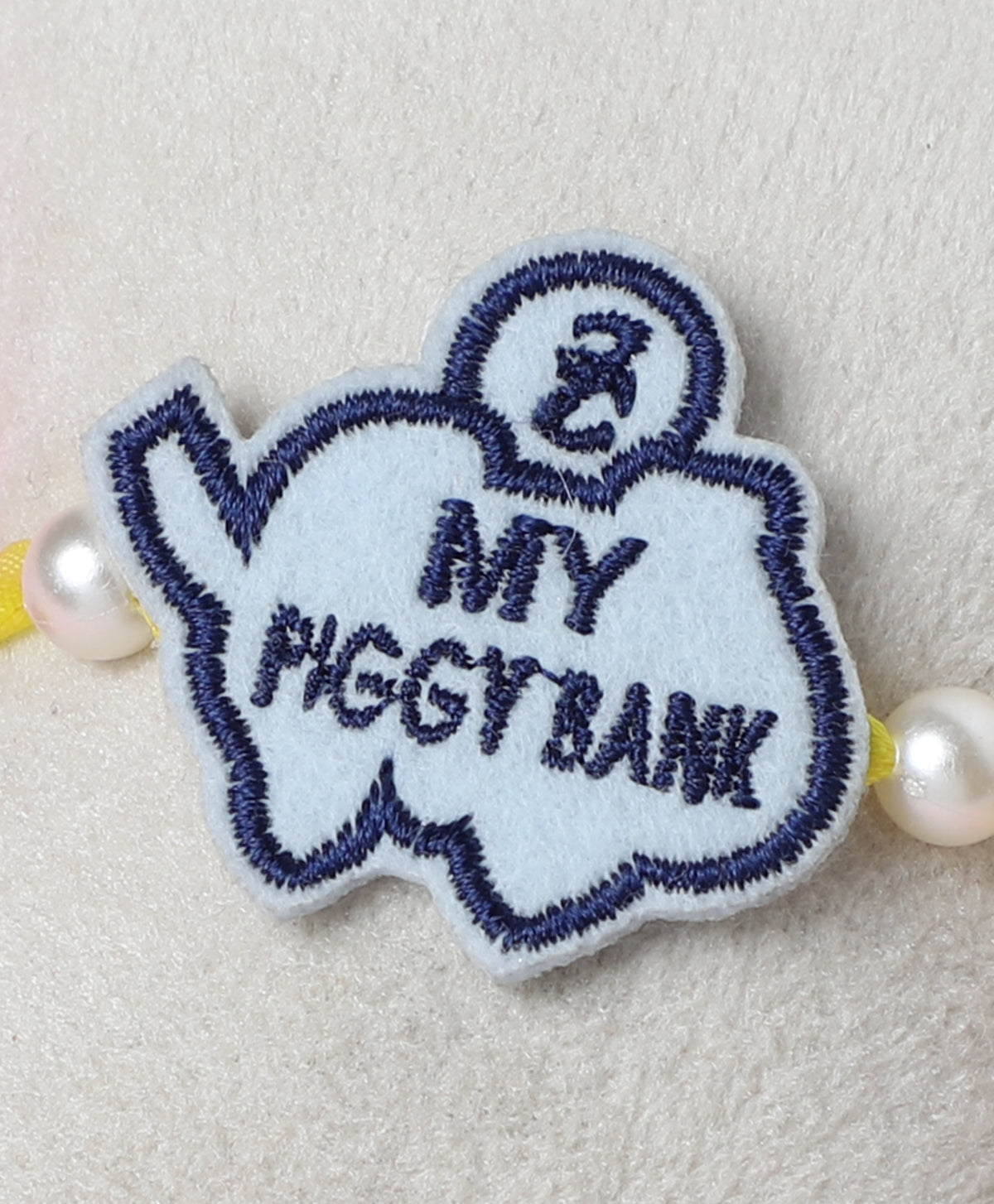 The Magic Wand Cute My Piggy Bank Rakhi - White