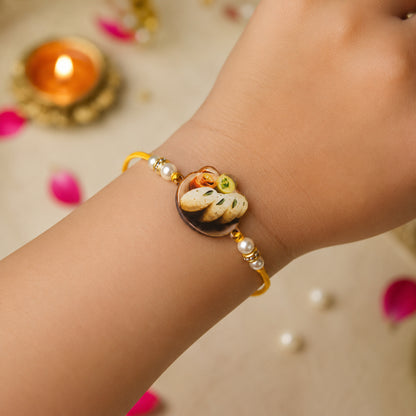 The Magic Wand Trendy Quirky Idli Wooden Rakhi With Pearls Embelishement-Multi