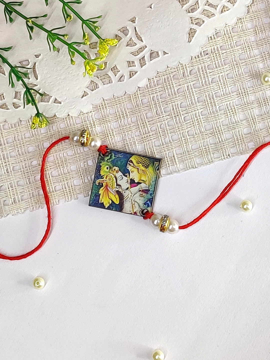 The Magic Wand Radha Krishna Wooden Rakhi With Pearls -Green