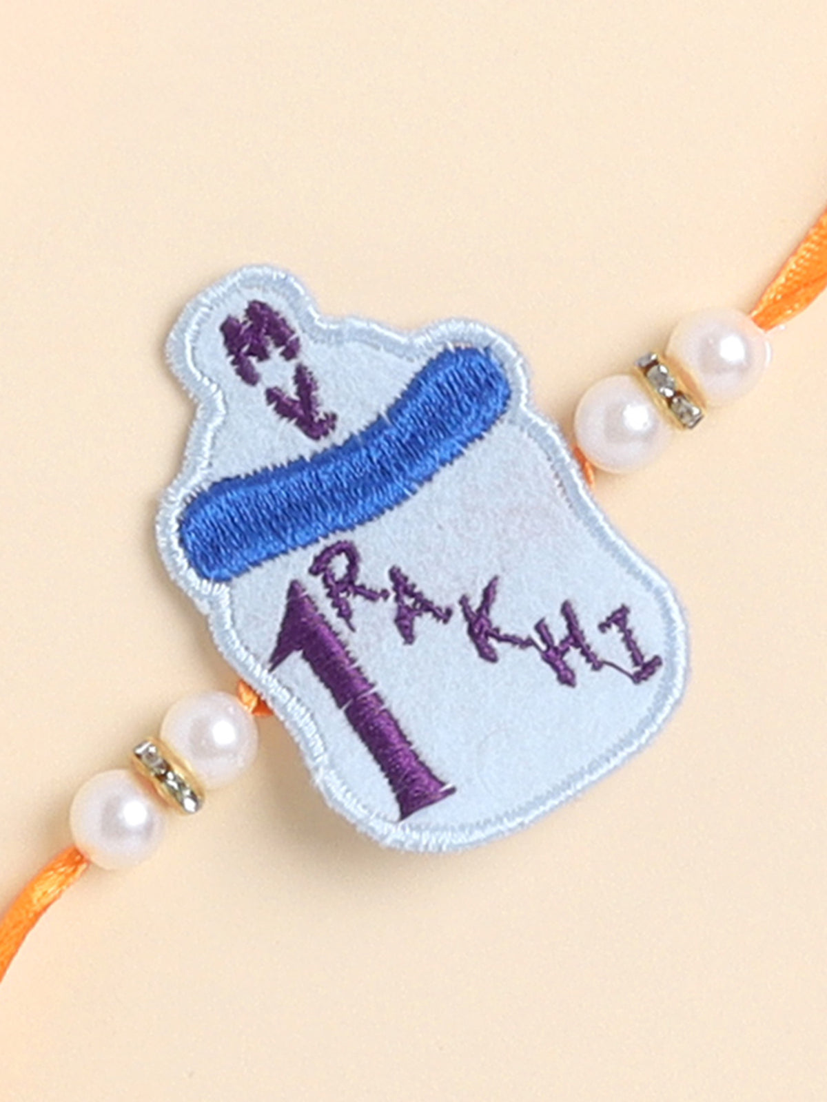 The Magic Wand Trendy Milk Bottle Applique My First Rakhi -Blue