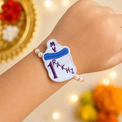 The Magic Wand Trendy Milk Bottle Applique My First Rakhi -Blue