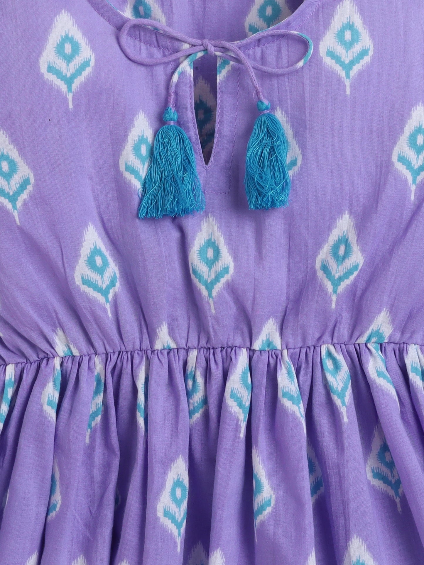 Cotton Three Fourth Sleeves Ikat Printed Top with Tassels -Purple