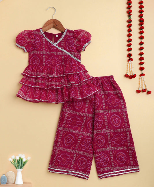 The Magic Wand Woven Puff Sleeves Bandhani Printed Ruffle Layered Top and Bottom Set- Fuchsia