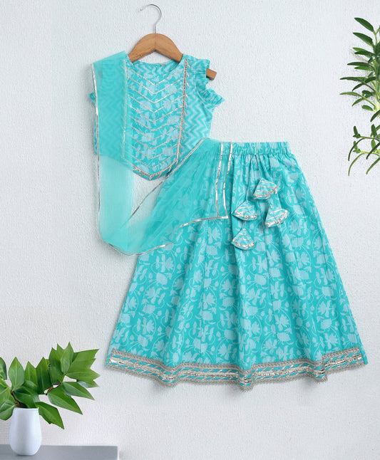 The Magic Wand Cambric Cotton Frill Sleeves AII Over Printed Lace Detailing Choli and Lehenga With Dupatta Set-  Blue