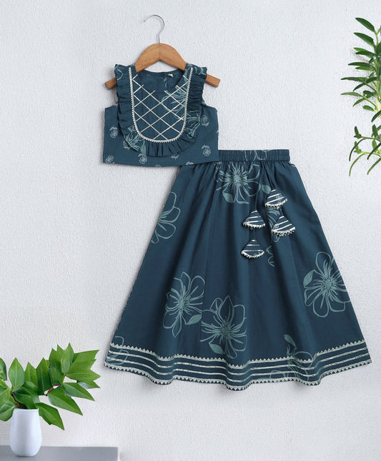 The Magic Wand Cambric Cotton Sleeveless Floral Printed Lace Detailing Frill Choli and Lehenga Set- Blue