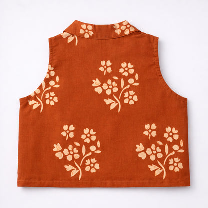 The Magic Wand Cotton Woven Sleeveless Floral Printed Waistcoat Top And Tiered Skirt Set - Rust