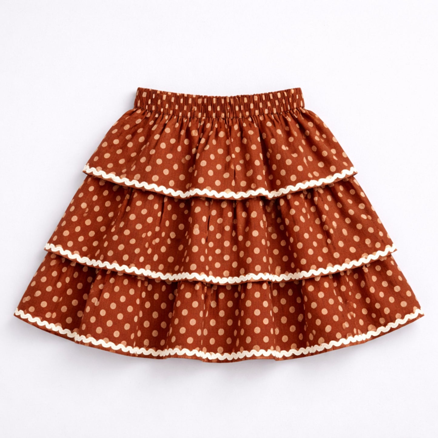 The Magic Wand Cotton Woven Sleeveless Floral Printed Waistcoat Top And Tiered Skirt Set - Rust