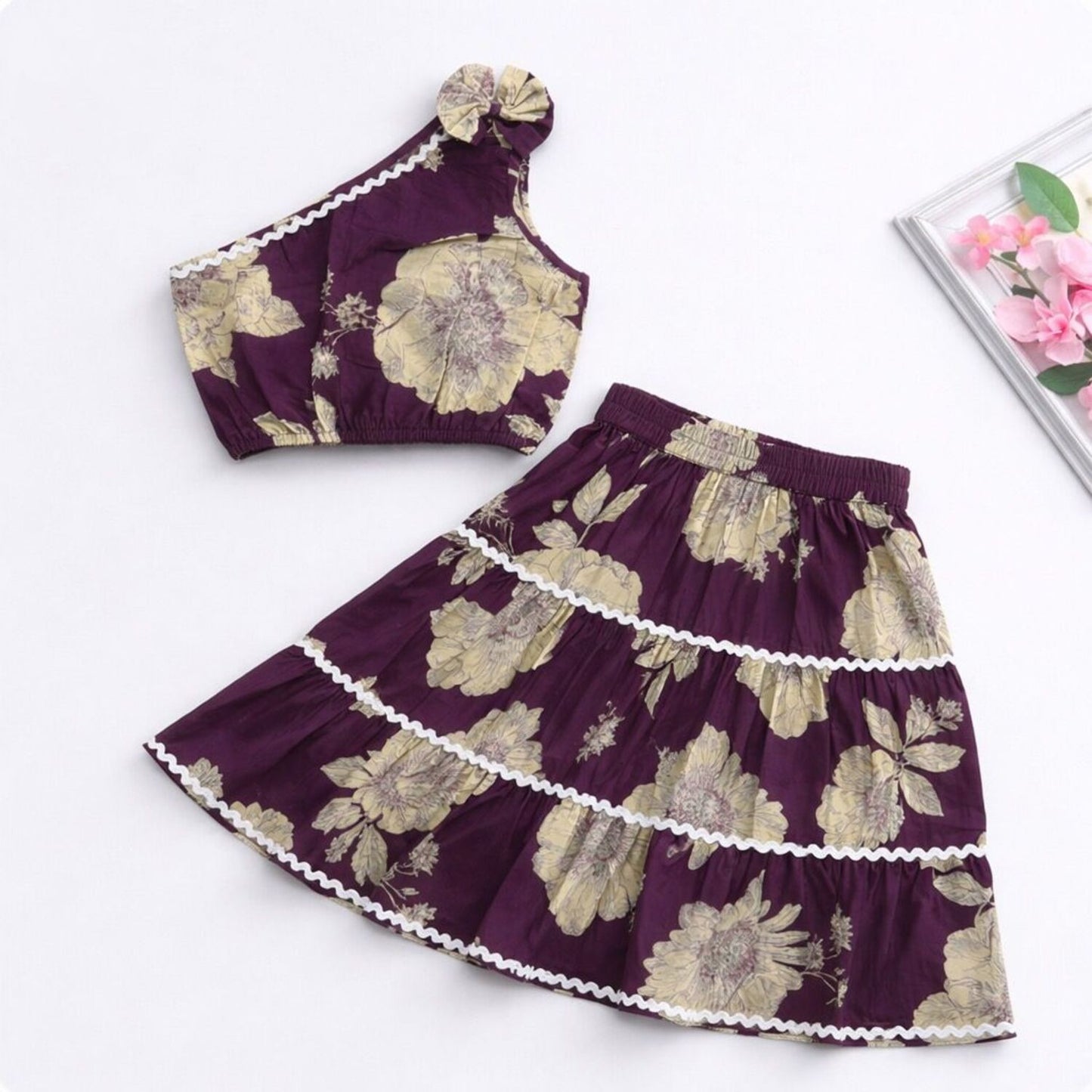 The Magic Wand Cambric Cotton Woven One Shoulder Floral Printed Laced Top And Tiered Skirt Set - Plum
