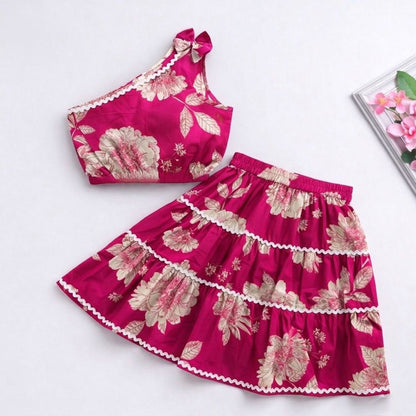 The Magic Wand Cambric Cotton Woven One Shoulder Floral Printed Laced Top And Tiered Skirt Set - Fuchsia